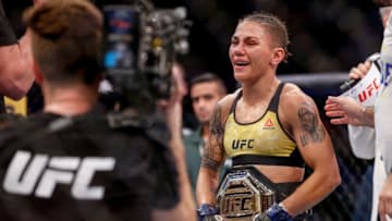 RIO DE JANEIRO, BRAZIL - MAY 11: Jessica Andrade of Brazil celebrates after her knockout victory over Rose Namajunas of USA in their women's strawweight championship bout during the UFC 237 event at Jeunesse Arena on May 11, 2019 in Rio de Janeiro, Brazil. (Photo by Alexandre Schneider/Getty Images)