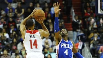 Feb 5, 2016; Washington, DC, USA; Washington Wizards guard Gary Neal (14) shoots as Philadelphia 76ers forward Nerlens Noel (4) defends during the first half at Verizon Center. Mandatory Credit: Brad Mills-USA TODAY Sports