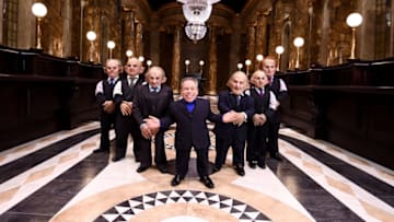 WATFORD, ENGLAND - MARCH 19: Warwick Davis (C) and Goblins in the original Gringotts Wizarding Bank set at Warner Bros. Studio Tour London on March 19, 2019 in Watford, England. Warner Bros. Studio Tour London – The Making of Harry Potter unveils its biggest expansion to date, the original Gringotts Wizarding Bank will be open to the public from Saturday 6th April. (Photo by Jeff Spicer/Getty Images for Warner Bros. Studio Tour London)