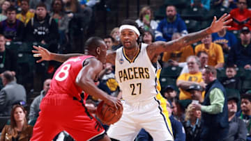 Mar 17, 2016; Indianapolis, IN, USA; Indiana Pacers center Jordan Hill (27) guards Toronto Raptors center Bismack Biyombo (8) at Bankers Life Fieldhouse. Mandatory Credit: Brian Spurlock-USA TODAY Sports