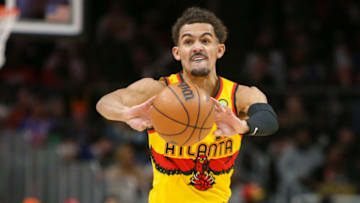 Jan 15, 2022; Atlanta, Georgia, USA; Atlanta Hawks guard Trae Young (11) passes the ball against the New York Knicks in the second half at State Farm Arena. Mandatory Credit: Brett Davis-USA TODAY Sports