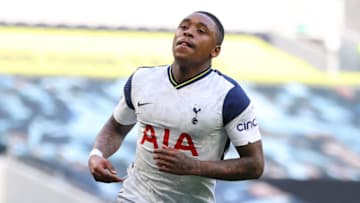 Tottenham Hotspur's Dutch midfielder Steven Bergwijn celebrates scoring his team's first goal during the English Premier League football match between Tottenham Hotspur and Aston Villa at Tottenham Hotspur Stadium in London, on May 19, 2021. - - RESTRICTED TO EDITORIAL USE. No use with unauthorized audio, video, data, fixture lists, club/league logos or 'live' services. Online in-match use limited to 120 images. An additional 40 images may be used in extra time. No video emulation. Social media in-match use limited to 120 images. An additional 40 images may be used in extra time. No use in betting publications, games or single club/league/player publications. (Photo by Richard Heathcote / POOL / AFP) / RESTRICTED TO EDITORIAL USE. No use with unauthorized audio, video, data, fixture lists, club/league logos or 'live' services. Online in-match use limited to 120 images. An additional 40 images may be used in extra time. No video emulation. Social media in-match use limited to 120 images. An additional 40 images may be used in extra time. No use in betting publications, games or single club/league/player publications. / RESTRICTED TO EDITORIAL USE. No use with unauthorized audio, video, data, fixture lists, club/league logos or 'live' services. Online in-match use limited to 120 images. An additional 40 images may be used in extra time. No video emulation. Social media in-match use limited to 120 images. An additional 40 images may be used in extra time. No use in betting publications, games or single club/league/player publications. (Photo by RICHARD HEATHCOTE/POOL/AFP via Getty Images)