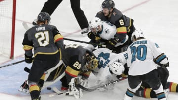 LAS VEGAS, NEVADA - MARCH 31: Players scramble for the puck as Vegas Golden Knights goaltender Marc-Andre Fleury (29) attempts a save during the third period of a regular season game between the San Jose Sharks and the Vegas Golden Knights Saturday, March 31, 2018, in Las Vegas, Nevada. The Vegas Golden Knights would defeat the San Jose Sharks 3-2 clinching the Pacific Division. (Photo by: Marc Sanchez/Icon Sportswire via Getty Images)