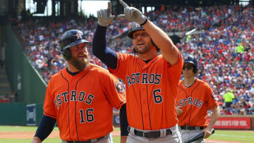 ARLINGTON, TX - MARCH 31: Brian McCann #16 looks at Jake Marisnick #6 of the Houston Astros as he celebrates his two run home run in the second inning of a baseball game at Globe Life Park in Arlington on March 31, 2018 in Arlington, Texas. (Photo by Richard Rodriguez/Getty Images)