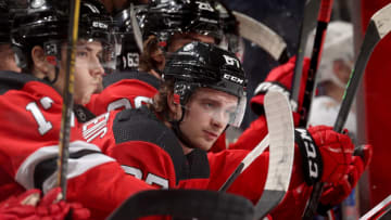 Marian Studenic #67 of the New Jersey Devils looks on from the bench during the first period against the Vegas Golden Knights at Prudential Center on December 16, 2021 in Newark, New Jersey. (Photo by Elsa/Getty Images)