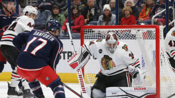 Nov 22, 2023; Columbus, Ohio, USA; Chicago Blackhawks goalie Petr Mrazek (34) makes a save from the shot of Columbus Blue Jackets right wing Justin Danforth (17) during the first period at Nationwide Arena. Mandatory Credit: Russell LaBounty-USA TODAY Sports