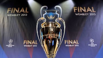 NYON, SWITZERLAND - DECEMBER 20: The UEFA Champions League trophy is displayed during the UEFA Champions League round of 16 draw at the UEFA headquarters on December 20, 2012 in Nyon, Switzerland. (Photo by Harold Cunningham/Getty Images)