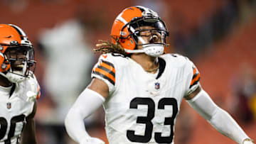 Aug 11, 2023; Cleveland, Ohio, USA; Cleveland Browns safety Ronnie Hickman Jr. (33) celebrates his interception against the Washington Commanders during the fourth quarter at Cleveland Browns Stadium. Mandatory Credit: Scott Galvin-USA TODAY Sports