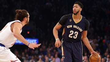 Jan 9, 2017; New York, NY, USA; New Orleans Pelicans power forward Anthony Davis (23) controls the ball against New York Knicks center Joakim Noah (13) during the first quarter at Madison Square Garden. Mandatory Credit: Brad Penner-USA TODAY Sports