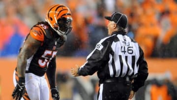 Jan 9, 2016; Cincinnati, OH, USA; Cincinnati Bengals outside linebacker Vontaze Burfict (55) talks with back judge Perry Paganelli (46) during the second quarter in the AFC Wild Card playoff football game at Paul Brown Stadium. Mandatory Credit: Christopher Hanewinckel-USA TODAY Sports