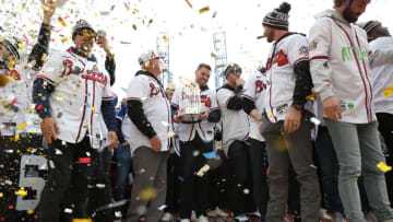 Nov 5, 2021; Atlanta, GA, USA; Atlanta Braves first baseman Freddie Freeman holds the Commissioner's Trophy during the World Series championship rally at Truist Park. Mandatory Credit: Brett Davis-USA TODAY Sports
