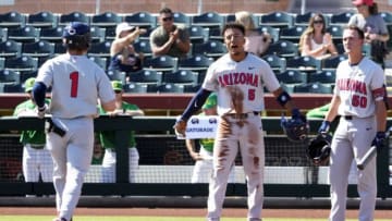 May 25, 2022; Scottsdale, Arizona, USA; Arizona Wildcats Chase Davis (5) reacts after Garen Caulfield (1) hit a two-run home run against the Oregon Ducks in the second inning during the Pac-12 Baseball Tournament at Scottsdale Stadium.Ncaa Baseball Arizona At Oregon