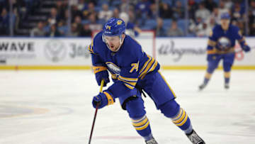 Nov 18, 2021; Buffalo, New York, USA; Buffalo Sabres right wing Rasmus Asplund (74) looks to take a shot on goal during the second period against the Calgary Flames at KeyBank Center. Mandatory Credit: Timothy T. Ludwig-USA TODAY Sports