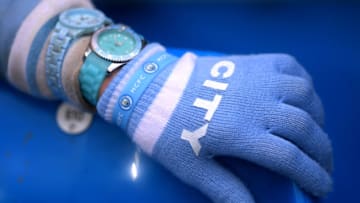 MANCHESTER, ENGLAND - JANUARY 26: A detailed view of a Manchester City fans hand during the FA Cup Fourth Round match between Manchester City and Fulham at Etihad Stadium on January 26, 2020 in Manchester, England. (Photo by Laurence Griffiths/Getty Images)
