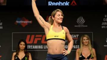Bethe Correia of Brazil stands on the weighing scale during the UFC Fight Night official weigh-in in Singapore on June 16, 2017.Holly Holm of the US will compete against Bethe Correia of Brazil in the UFC women's bantamweight event at the UFC Fight Night in Singapore on June 17. / AFP PHOTO / Roslan RAHMAN (Photo credit should read ROSLAN RAHMAN/AFP/Getty Images)