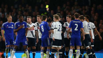 LONDON, ENGLAND - MAY 02: Referee Mark Clattenburg shows a yellow card to John Mikel Obi of Chelsea during the Barclays Premier League match between Chelsea and Tottenham Hotspur at Stamford Bridge on May 02, 2016 in London, England.jd (Photo by Ian Walton/Getty Images)