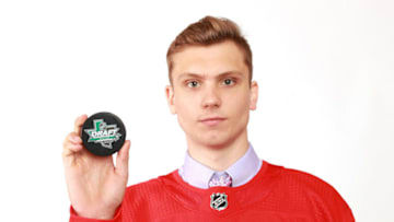 DALLAS, TX - JUNE 23: Alec Regula poses after being selected 67th overall by the Detroit Red Wings during the 2018 NHL Draft at American Airlines Center on June 23, 2018 in Dallas, Texas. (Photo by Tom Pennington/Getty Images)