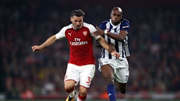 LONDON, ENGLAND - SEPTEMBER 25: Sead Kolasinac of Arsenal and Allan Nyom of West Bromwich Albion battle for the ball during the Premier League match between Arsenal and West Bromwich Albion at Emirates Stadium on September 25, 2017 in London, England. (Photo by Michael Steele/Getty Images)