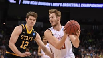 March 18, 2016; Spokane , WA, USA; Maryland Terrapins forward Jake Layman (10) moves to the basket against South Dakota State Jackrabbits guard Keaton Moffitt (12) during the first half at Spokane Veterans Memorial Arena. Mandatory Credit: Kyle Terada-USA TODAY Sport