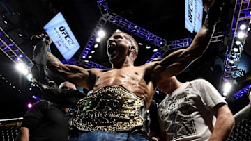 NEW YORK, NY - NOVEMBER 04: TJ Dillashaw celebrates his knockout victory over Cody Garbrandt in their UFC bantamweight championship bout during the UFC 217 event inside Madison Square Garden on November 4, 2017 in New York City. (Photo by Brandon Magnus/Zuffa LLC/Zuffa LLC via Getty Images)