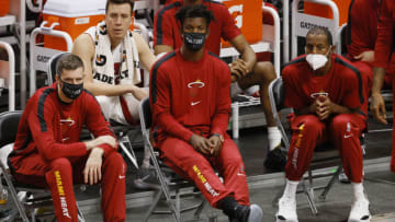 Goran Dragic #7, Duncan Robinson #55, Jimmy Butler #22, and Andre Iguodala #28 of the Miami Heat look on during the fourth quarter of a preseason game(Photo by Michael Reaves/Getty Images)