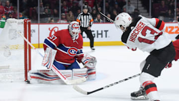 MONTREAL, QC - FEBRUARY 2: Nico Hischier #13 of the New Jersey Devils shots to score the winning goal against the Montreal Canadiens in the NHL game at the Bell Centre on February 2, 2019 in Montreal, Quebec, Canada. (Photo by Francois Lacasse/NHLI via Getty Images)