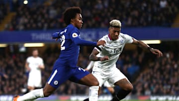 LONDON, ENGLAND - MARCH 10: Willian of Chelsea is challenged by Patrick van Aanholt of Crystal Palace during the Premier League match between Chelsea and Crystal Palace at Stamford Bridge on March 10, 2018 in London, England. (Photo by Clive Rose/Getty Images)