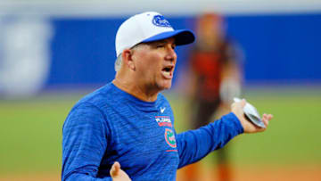 OKLAHOMA CITY, OK - JUNE 4: Head coach Tim Walton of the Florida Gators challenges a call in the sixth inning against the the Oklahoma State Cowboys during the NCAA Women's College World Series at the USA Softball Hall of Fame Complex on June 4, 2022 in Oklahoma City, Oklahoma. Oklahoma State won 2-0. (Photo by Brian Bahr/Getty Images)