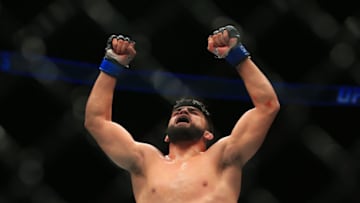 TORONTO, ON - DECEMBER 10: Kelvin Gastelum of the United States celebrates victory over Tim Kennedy of the United States in their Middleweight bout during the UFC 206 event at Air Canada Centre on December 10, 2016 in Toronto, Canada. (Photo by Vaughn Ridley/Getty Images)