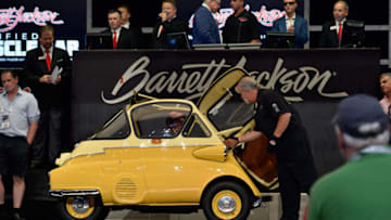 UNCASVILLE, CT - JUNE 25: A 1956 BMW Isetta is auctioned at the Barrett-Jackson Inaugural Northeast Auction at Mohegan Sun Arena on June 25, 2016 in Uncasville, Connecticut. Organizers estimated app. 70,000 vistors attended the three day auction June 23-25 during which hundreds of collectors were sold at auction. (Photo by Paul Marotta/Getty Images)