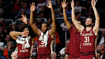 MIAMI, FLORIDA - JANUARY 27: The Florida State Seminoles bench reacts against the Miami Hurricanes during the second half at Watsco Center on January 27, 2019 in Miami, Florida. (Photo by Michael Reaves/Getty Images)