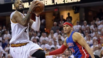 Apr 17, 2016; Cleveland, OH, USA; Cleveland Cavaliers guard Kyrie Irving (2) goes for a shot as Detroit Pistons forward Tobias Harris (34) watches during the fourth quarter in game one of the first round of the NBA Playoffs at Quicken Loans Arena. The Cavs beat the Pistons 106-101. Mandatory Credit: Ken Blaze-USA TODAY Sports