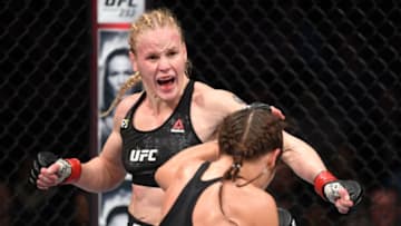 TORONTO, CANADA - DECEMBER 08: (L-R) Valentina Shevchenko of Kyrgyzstan battles Joanna Jedrzejczyk of Poland in their UFC strawweight championship fight during the UFC 231 event at Scotiabank Arena on December 8, 2018 in Toronto, Canada. (Photo by Josh Hedges/Zuffa LLC/Zuffa LLC via Getty Images)