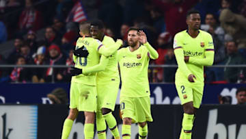 MADRID, SPAIN - NOVEMBER 24: Ousmane Dembele of Barcelona (2L) celebrates after scoring his team's first goal with Jordi Alba and Lionel Messi during the La Liga match between Club Atletico de Madrid and FC Barcelona at Wanda Metropolitano on November 24, 2018 in Madrid, Spain. (Photo by Denis Doyle/Getty Images)