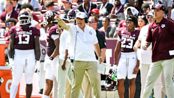 Jimbo Fisher egregiously tried to prevent an Auburn football scoop-and-score fumble recovery touchdown from Eugene Asante (Photo by Logan Riely/Getty Images)
