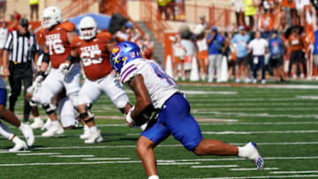 Sep 30, 2023; Austin, Texas, USA; Kansas Jayhawks linebacker Cornell Wheeler (44) runs after catching an interception during the first half against the Texas Longhorns at Darrell K Royal-Texas Memorial Stadium. Mandatory Credit: Scott Wachter-USA TODAY Sports