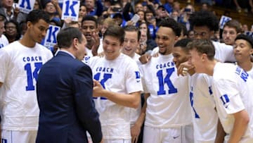DURHAM, NC - NOVEMBER 11: Head coach Mike Krzyzewski of the Duke Blue Devils talks to his team following their 99-69 win against the Utah Valley Wolverines at Cameron Indoor Stadium on November 11, 2017 in Durham, North Carolina. The win gives Mike Krzyzewski his 1,000th victory as Duke's head coach and his 1,073rd overall (73 at Army).(Photo by Lance King/Getty Images)