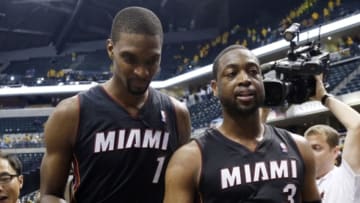 May 20, 2014; Indianapolis, IN, USA; Miami Heat center Chris Bosh (1) and guard Dwayne Wade (3) walk off the floor after defeating the Indiana Pacers in game two of the Eastern Conference Finals of the 2014 NBA Playoffs at Bankers Life Fieldhouse. Miami defeats Indiana 87-83. Mandatory Credit: Brian Spurlock-USA TODAY Sports