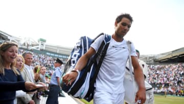 LONDON, ENGLAND - JULY 10: Rafael Nadal of Spain looks dejected in defeat after the Gentlemen's Singles fourth round match against Gilles Muller of Luxembourg on day seven of the Wimbledon Lawn Tennis Championships at the All England Lawn Tennis and Croquet Club on July 10, 2017 in London, England. (Photo by David Ramos/Getty Images)