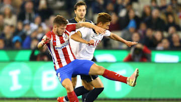 MELBOURNE, AUSTRALIA - JULY 29: Son Heung-min of Tottenham Hotspur and Saul Niguez of Atletico de Madrid compete for the ball during 2016 International Champions Cup Australia match between Tottenham Hotspur and Atletico de Madrid at the Melbourne Cricket Ground on July 29, 2016 in Melbourne, Australia. (Photo by Scott Barbour/Getty Images)