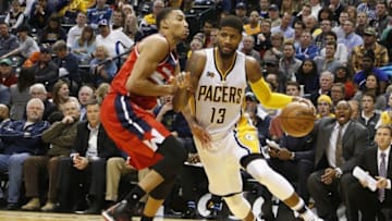Dec 19, 2016; Indianapolis, IN, USA; Indiana Pacers forward Paul George (13) moves to the basket against Washington Wizards forward Otto Porter (22) at Bankers Life Fieldhouse. Indiana defeats Washington 107-105. Mandatory Credit: Brian Spurlock-USA TODAY Sports