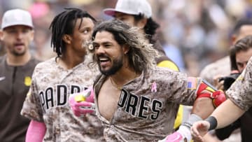 SAN DIEGO, CA - MAY 8: Jorge Alfaro #38 of the San Diego Padres celebrates after hitting a three-run walk-off home run during the ninth inning of a baseball game against the Miami Marlins on May 8, 2022 at Petco Park in San Diego, California. Major League Baseball players and coaches are wearing pink today in honor of Mother's Day. (Photo by Denis Poroy/Getty Images)