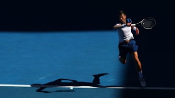 MELBOURNE, AUSTRALIA - JANUARY 16: Novak Djokovic of Serbia plays a forehand in his first round match against Donald Young of the United States on day two of the 2018 Australian Open at Melbourne Park on January 16, 2018 in Melbourne, Australia. (Photo by Clive Brunskill/Getty Images)