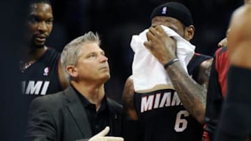 Feb 20, 2014; Oklahoma City, OK, USA; Miami Heat small forward LeBron James (6) walks off of the court after suffering an apparent injury against the Oklahoma City Thunder during the fourth quarter at Chesapeake Energy Arena. Mandatory Credit: Mark D. Smith-USA TODAY Sports