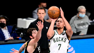 NEW YORK, NEW YORK - JUNE 07: Bryn Forbes #7 of the Milwaukee Bucks attempts a shot against Joe Harris #12 of the Brooklyn Nets (Photo by Steven Ryan/Getty Images)