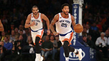 Nov 2, 2016; New York, NY, USA; New York Knicks point guard Derrick Rose (25) controls the ball against the Houston Rockets in front of New York Knicks center Joakim Noah (13) during the third quarter at Madison Square Garden. Mandatory Credit: Brad Penner-USA TODAY Sports