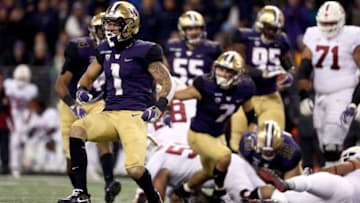 SEATTLE, WA - NOVEMBER 03: Byron Murphy #1 of the Washington Huskies celebrates in the first quarter against the Stanford Cardinal during their game at Husky Stadium on November 3, 2018 in Seattle, Washington. (Photo by Abbie Parr/Getty Images)