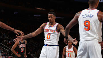NEW YORK, NY - MARCH 19: Troy Williams #0 of the New York Knicks high fives teammates during the game against the Chicago Bulls on March 19, 2018 at Madison Square Garden in New York City, New York. NOTE TO USER: User expressly acknowledges and agrees that, by downloading and/or using this photograph, user is consenting to the terms and conditions of the Getty Images License Agreement. Mandatory Copyright Notice: Copyright 2018 NBAE (Photo by Nathaniel S. Butler/NBAE via Getty Images)