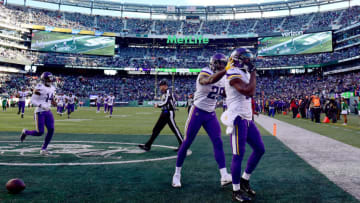 EAST RUTHERFORD, NJ - OCTOBER 21: Aldrick Robinson #17 of the Minnesota Vikings is congratulated by his teammate Latavius Murray #25 after his fourth quarter touchdown against the New York Jets at MetLife Stadium on October 21, 2018 in East Rutherford, New Jersey. The Vikings defeated the Jets 37-17. (Photo by Steven Ryan/Getty Images)