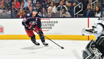 COLUMBUS, OH - OCTOBER 21: Boone Jenner #38 of the Columbus Blue Jackets skates the puck towards goaltender Jonathan Quick #32 of the Los Angeles Kings during the third period of a game on October 21, 2017 at Nationwide Arena in Columbus, Ohio. (Photo by Jamie Sabau/NHLI via Getty Images)